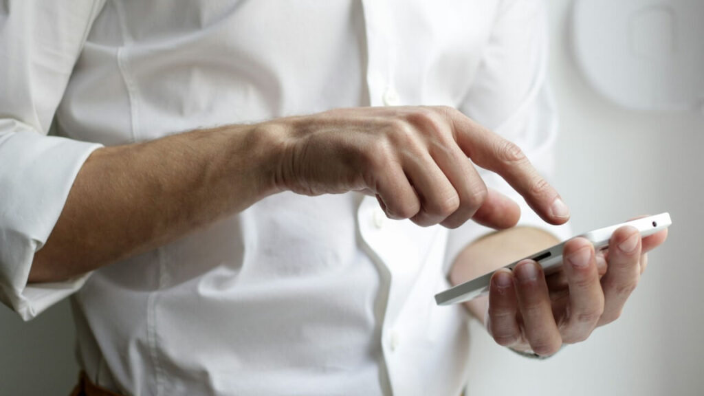 man-finger-smartphone